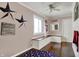 Themed bedroom with unique decor, custom bunk beds, and hardwood floors at 7003 Eagle Dr, Nineveh, IN 46164
