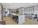 Spacious kitchen with stainless steel appliances, gray cabinets, and an island with granite countertop at 7003 Eagle Dr, Nineveh, IN 46164