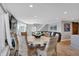 Inviting living area with hardwood floors, lake views, and comfortable seating, perfect for relaxation and entertaining at 7003 Eagle Dr, Nineveh, IN 46164
