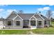Charming home featuring a manicured lawn, stylish gray siding, and inviting front entrance at 706 E 750 N, Lebanon, IN 46052