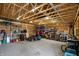 Spacious garage featuring exposed rafters, ample storage space, and tools at 706 E 750 N, Lebanon, IN 46052