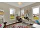 Inviting office space with three large windows overlooking the yard and colorful decor at 706 E 750 N, Lebanon, IN 46052