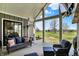 Covered patio area with comfortable furniture and expansive golf course views at 706 E 750 N, Lebanon, IN 46052