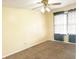 Cozy bedroom featuring carpeting, neutral walls, and a ceiling fan at 7201 Barnwell Pl, Indianapolis, IN 46217