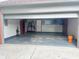 Spacious garage with ample storage, a clean floor, and an open door for easy access at 7201 Barnwell Pl, Indianapolis, IN 46217
