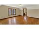 Spacious bedroom offers hardwood floors, natural light, and an ensuite bathroom at 7545 Chablis Cir, Indianapolis, IN 46278