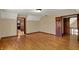 Large bonus room offers hardwood floors and multiple doorways at 7545 Chablis Cir, Indianapolis, IN 46278