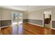 Formal dining area featuring chair rail and hardwood floors at 7545 Chablis Cir, Indianapolis, IN 46278