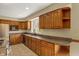 Traditional kitchen with granite countertops, oak cabinets and stainless steel appliances at 7545 Chablis Cir, Indianapolis, IN 46278