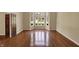 Large living room with hardwood floors, bay window and natural light at 7545 Chablis Cir, Indianapolis, IN 46278