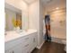 Bright bathroom featuring a double sink vanity and a shower over tub combination at 7636 Big Bend Blvd, Camby, IN 46113