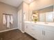 Bright bathroom featuring double vanity sinks with ample counter space and stylish fixtures at 7636 Big Bend Blvd, Camby, IN 46113