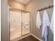 Modern bathroom featuring a glass-enclosed shower and convenient towel hooks for a spa-like experience at 7636 Big Bend Blvd, Camby, IN 46113