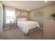Relaxing bedroom with soft lighting, large windows, and cozy decor at 7636 Big Bend Blvd, Camby, IN 46113