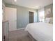 Stylish bedroom with a well-lit walk-in closet and a comfortable sleeping space at 7636 Big Bend Blvd, Camby, IN 46113