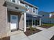 Inviting home entrance with brick, gray siding, and a visible street number at 7636 Big Bend Blvd, Camby, IN 46113