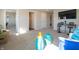 Spacious living room with access to multiple rooms, and great natural light at 7636 Big Bend Blvd, Camby, IN 46113