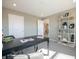Office with neutral paint, a modern black desk, and a decorative gold shelving unit at 7636 Big Bend Blvd, Camby, IN 46113