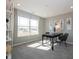 Well-lit office space featuring a large window and modern decor, perfect for remote work at 7636 Big Bend Blvd, Camby, IN 46113