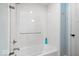 Bright bathroom featuring subway tile surround, updated fixtures, and a glass shower enclosure at 7638 Beekman Ter, Zionsville, IN 46077