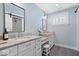 Bathroom features double sinks, granite countertops, and a large mirror. Bathtub visible in background at 7638 Beekman Ter, Zionsville, IN 46077