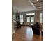 Welcoming entryway with natural light, grand clock, and seamless flow into the living space at 7638 Beekman Ter, Zionsville, IN 46077