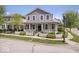 Charming two-story home boasts a welcoming front porch and a well-manicured lawn with a classic white picket fence at 7638 Beekman Ter, Zionsville, IN 46077