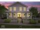 Charming two-story home with a welcoming front porch, white picket fence and professionally landscaped yard at 7638 Beekman Ter, Zionsville, IN 46077
