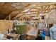 View of an unfinished basement with exposed wood and storage at 7638 Beekman Ter, Zionsville, IN 46077