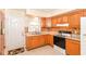 Functional kitchen featuring wood cabinets, bright countertop and convenient layout at 7735 E 50Th St, Indianapolis, IN 46226