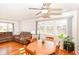 Open floorplan with hardwood floors, natural light, dining and living areas at 7735 E 50Th St, Indianapolis, IN 46226