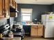 Kitchen featuring appliances and a window at 801 N Denny St, Indianapolis, IN 46201