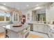 Bright kitchen with island, stainless steel appliances, and window view at 8027 Heyward Dr, Indianapolis, IN 46250