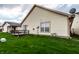 Backyard view showing the wood deck and siding of the home at 8116 Heritage Commons Dr # Bldg 24, Indianapolis, IN 46219