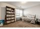 Inviting bedroom with a daybed, bookshelf, and natural light at 8116 Heritage Commons Dr # Bldg 24, Indianapolis, IN 46219