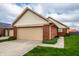 Charming one-story home with a brick exterior and a well-maintained lawn in a suburban neighborhood at 8116 Heritage Commons Dr # Bldg 24, Indianapolis, IN 46219