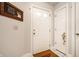 Bright entryway featuring a white front door, tile floor, and a Central State University doormat at 8116 Heritage Commons Dr # Bldg 24, Indianapolis, IN 46219