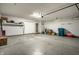 Spacious garage featuring ample storage and a clean concrete floor at 8116 Heritage Commons Dr # Bldg 24, Indianapolis, IN 46219