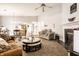 Inviting living space with a fireplace, warm lighting, and seamlessly connected to the dining and kitchen areas at 8116 Heritage Commons Dr # Bldg 24, Indianapolis, IN 46219