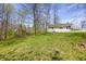 Backyard with grassy lawn and trees around at 8644 S Kinman Dr, , IN 46164