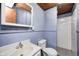 Bathroom features a tiled shower, vanity with sink, medicine cabinet and toilet at 8644 S Kinman Dr, , IN 46164