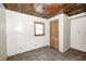 Bedroom with a wood ceiling, tile floor, window and closet at 8644 S Kinman Dr, , IN 46164