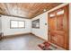 Bright living room with wood ceiling and natural light at 8644 S Kinman Dr, , IN 46164