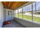 Inviting screened porch with wood ceiling and ample natural light at 8644 S Kinman Dr, , IN 46164