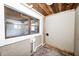 Room features a wood ceiling, tile floor, window and sink at 8644 S Kinman Dr, , IN 46164