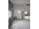 An interior view showcasing the home's open layout with new drywall installed at 1016 Dawson St, Indianapolis, IN 46203