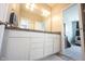 Well-lit bathroom vanity featuring clean white drawers and a marble countertop at 1099 Valentine Ln, Carmel, IN 46032