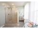 Modern bathroom with large marble tiled walk-in shower and glass door at 1099 Valentine Ln, Carmel, IN 46032