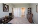 Bedroom with a cozy setup and three doorways, offering a relaxed ambiance at 1099 Valentine Ln, Carmel, IN 46032