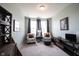 Bedroom featuring two chairs with decorative cushions, providing a cozy space at 1099 Valentine Ln, Carmel, IN 46032